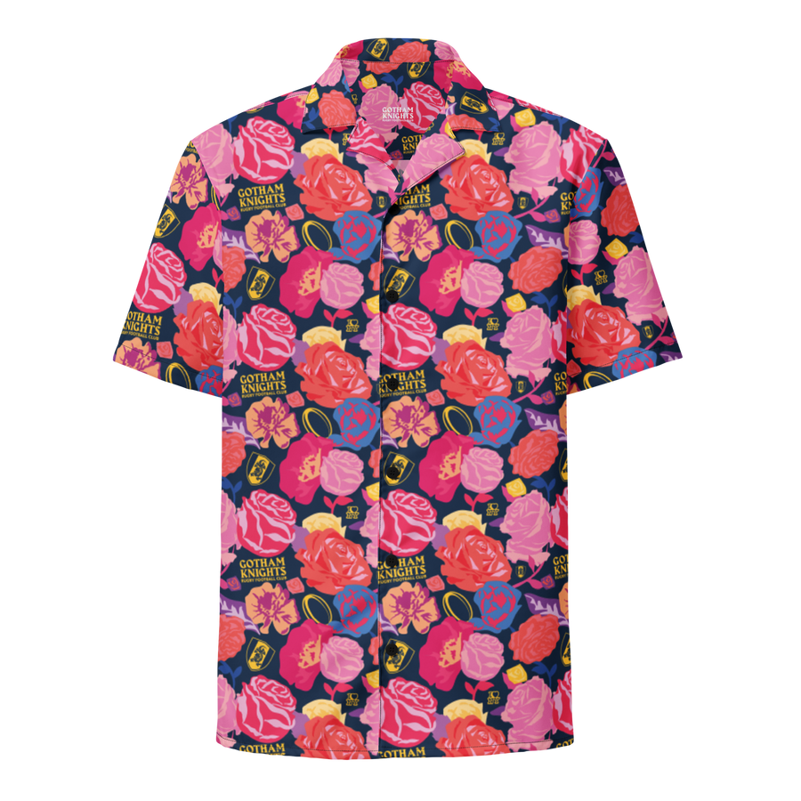 Gotham Knights Signature Hawaiian shirt laid flat, front view — navy camp-collar shirt in an all-over pink and red rose print with club crests